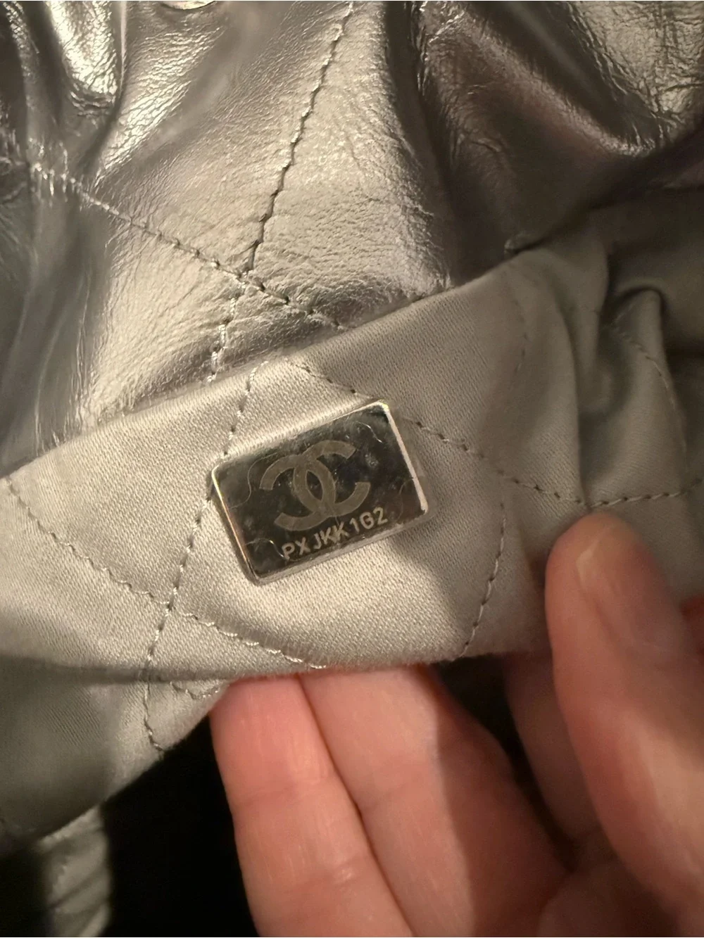 Chanel 22 in Metallic silver leather with silver hardware